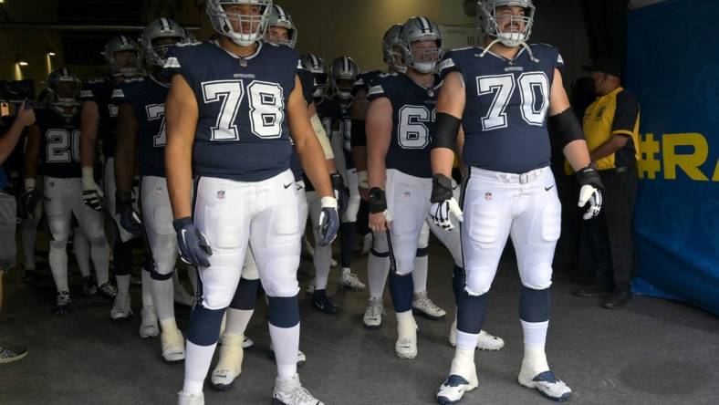 Oct 9, 2022; Inglewood, California, USA; Dallas Cowboys offensive tackle Terence Steele (78) and guard Zack Martin (70) enter the field for the game against the Los Angeles Rams at SoFi Stadium. Mandatory Credit: Jayne Kamin-Oncea-USA TODAY Sports