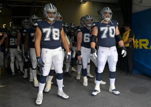 Oct 9, 2022; Inglewood, California, USA; Dallas Cowboys offensive tackle Terence Steele (78) and guard Zack Martin (70) enter the field for the game against the Los Angeles Rams at SoFi Stadium. Mandatory Credit: Jayne Kamin-Oncea-USA TODAY Sports
