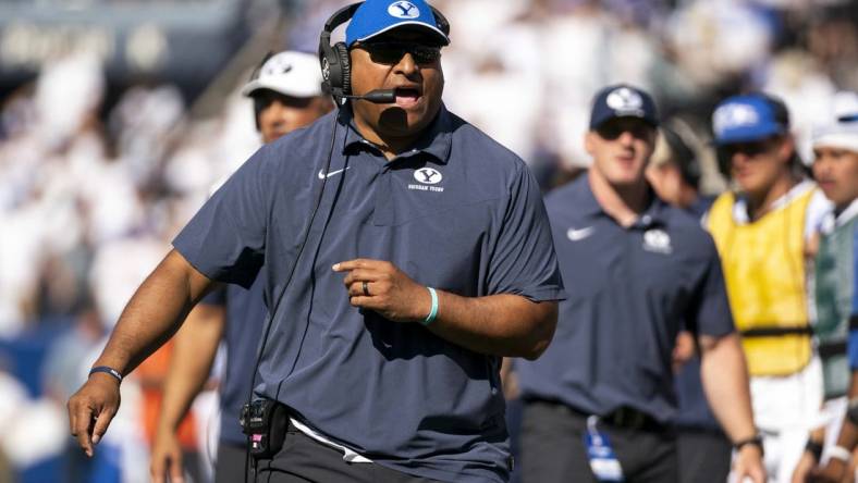 Oct 15, 2022; Provo, Utah, USA; Brigham Young University Cougars coach Kalani Sitake yells towards the referees during the first half as the Cougars face the Arkansas Razorbacks at LaVell Edwards Stadium. Mandatory Credit: Gabriel Mayberry-USA TODAY Sports