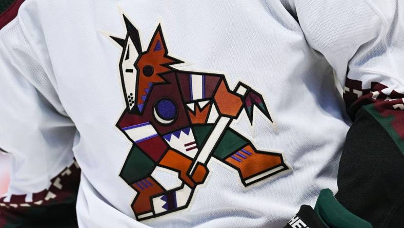 Oct 20, 2022; Montreal, Quebec, CAN; View of an Arizona Coyotes logo on a jersey worn by a member of the team during the third period at Bell Centre. Mandatory Credit: David Kirouac-USA TODAY Sports