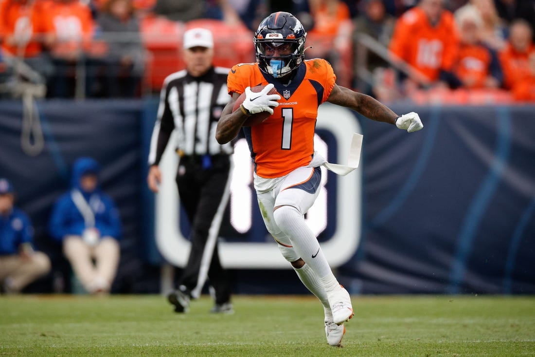 Oct 23, 2022; Denver, Colorado, USA; Denver Broncos wide receiver KJ Hamler (1) runs the ball in the third quarter against the New York Jets at Empower Field at Mile High. Mandatory Credit: Isaiah J. Downing-USA TODAY Sports