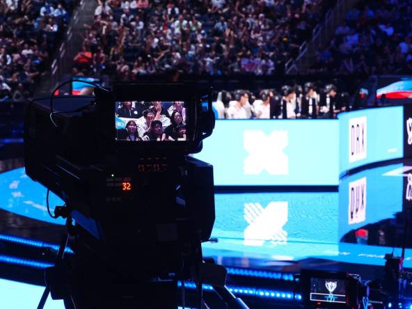 Nov 5, 2022; San Francisco, California, USA; A camera follow fans with DRX in the background during the League of Legends World Championships against T1 at Chase Center. Mandatory Credit: Kelley L Cox-USA TODAY Sports