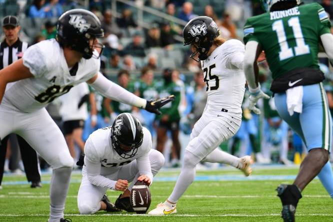 Nov 12, 2022; New Orleans, Louisiana, USA; UCF Knights place kicker Colton Boomer (35) kicks a field goal following a touchdown during the first quarter against the Tulane Green Wave at Yulman Stadium. Mandatory Credit: Rebecca Warren-USA TODAY Sports