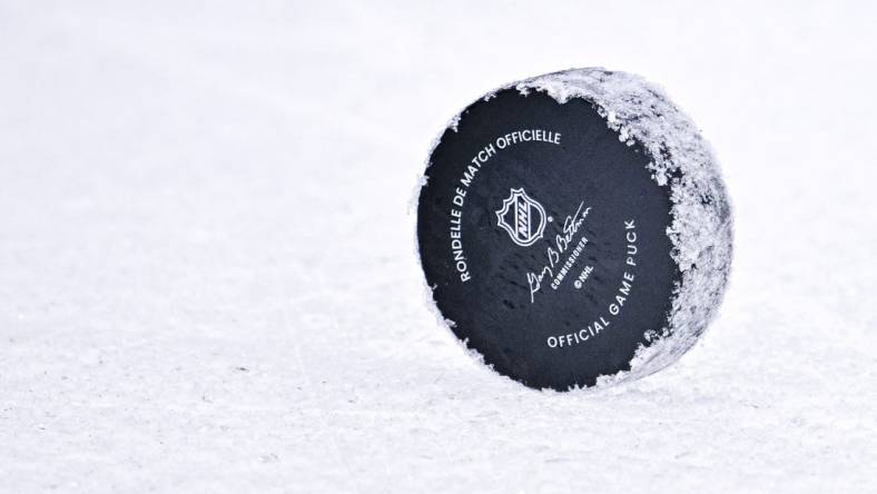 Oct 27, 2022; Dallas, Texas, USA; A general view of an NHL hockey puck during the game between the Dallas Stars and the Washington Capitals at the American Airlines Center. Mandatory Credit: Jerome Miron-USA TODAY Sports