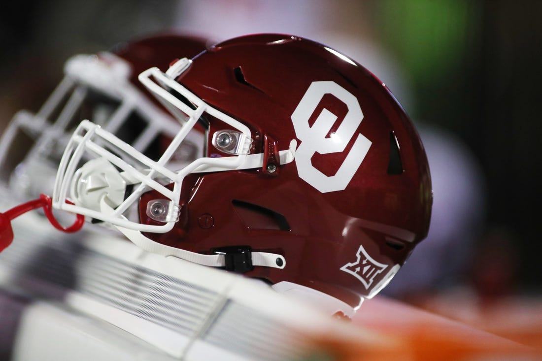 Nov 26, 2022; Lubbock, Texas, USA;  A general view of an Oklahoma Sooners helmet on the bench during the game between against the Texas Tech Red Raiders at Jones AT&T Stadium and Cody Campbell Field. Mandatory Credit: Michael C. Johnson-USA TODAY Sports