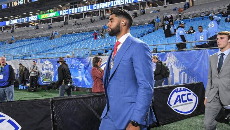 Clemson quarterback DJ Uiagalelei walks on the field before the ACC Championship football game with North Carolina at Bank of America Stadium in Charlotte, North Carolina Saturday, Dec 3, 2022.

Clemson Tigers Football Vs North Carolina Tar Heels Acc Championship Charlotte Nc