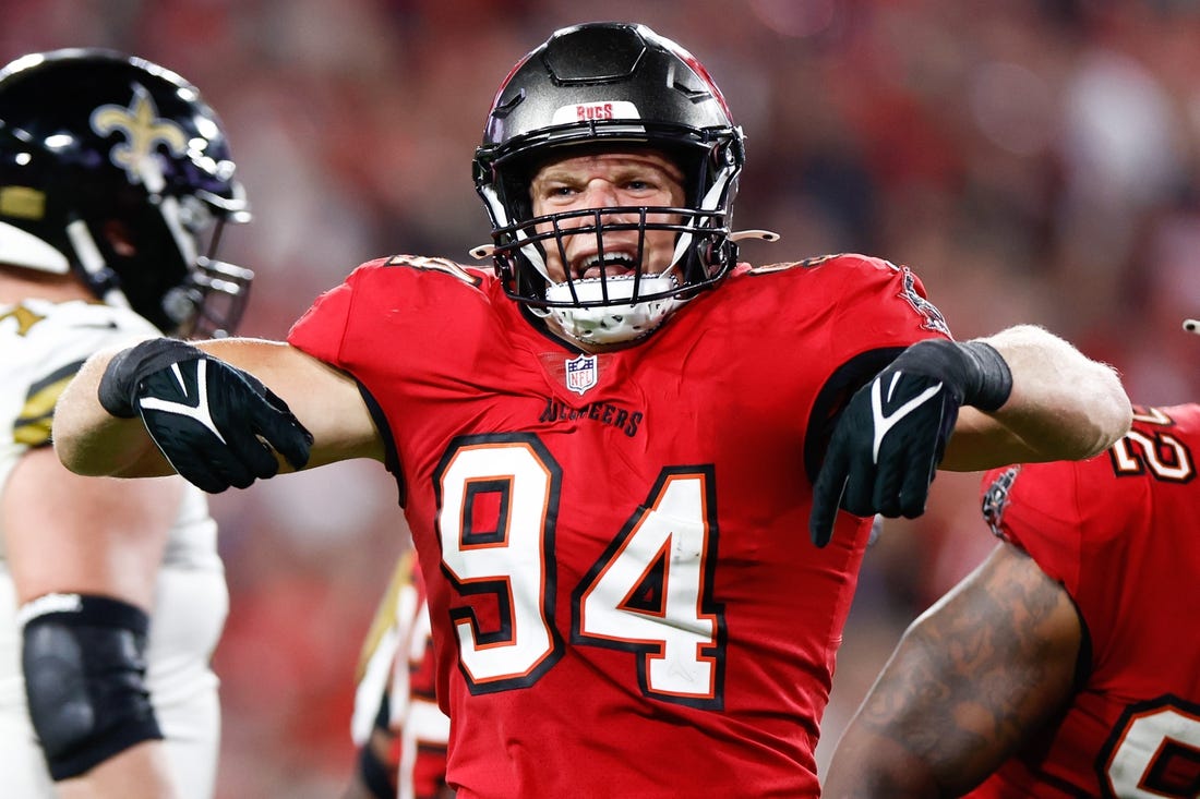 Dec 5, 2022; Tampa, Florida, USA; Tampa Bay Buccaneers linebacker Carl Nassib (94) reacts after sacking New Orleans Saints quarterback Andy Dalton (14) during the fourth quarter at Raymond James Stadium. Mandatory Credit: Douglas DeFelice-USA TODAY Sports