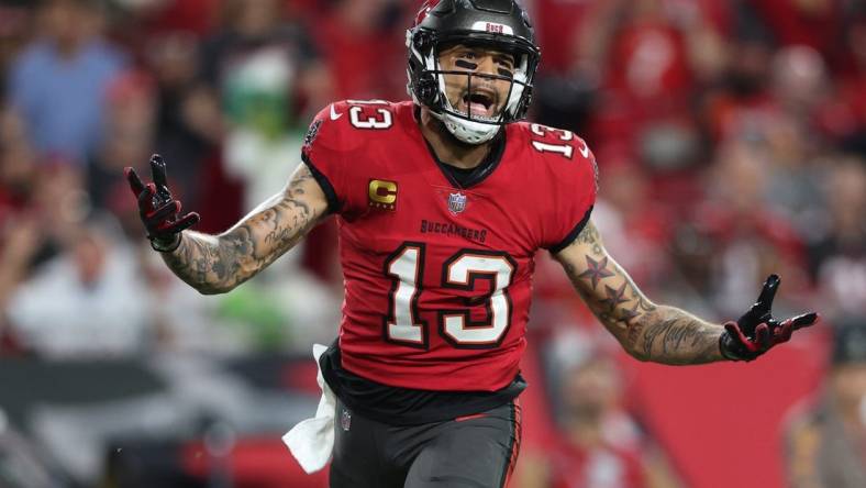 Dec 5, 2022; Tampa, Florida, USA;  Tampa Bay Buccaneers wide receiver Mike Evans (13) reacts after a flag against the New Orleans Saints in the fourth quarter at Raymond James Stadium. Mandatory Credit: Nathan Ray Seebeck-USA TODAY Sports