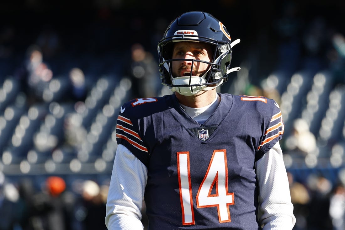 Dec 18, 2022; Chicago, Illinois, Chicago Bears quarterback Nathan Peterman (14) practices before the game against the Philadelphia Eagles  at Soldier Field. Mandatory Credit: Mike Dinovo-USA TODAY Sports