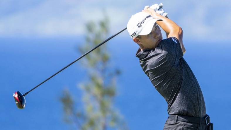 January 8, 2023; Maui, Hawaii, USA; Collin Morikawa hits his tee shot on the 13th hole during the final round of the Sentry Tournament of Champions golf tournament at Kapalua Resort - The Plantation Course. Mandatory Credit: Kyle Terada-USA TODAY Sports