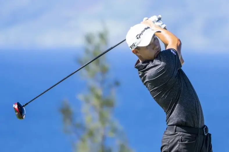 January 8, 2023; Maui, Hawaii, USA; Collin Morikawa hits his tee shot on the 13th hole during the final round of the Sentry Tournament of Champions golf tournament at Kapalua Resort - The Plantation Course. Mandatory Credit: Kyle Terada-USA TODAY Sports