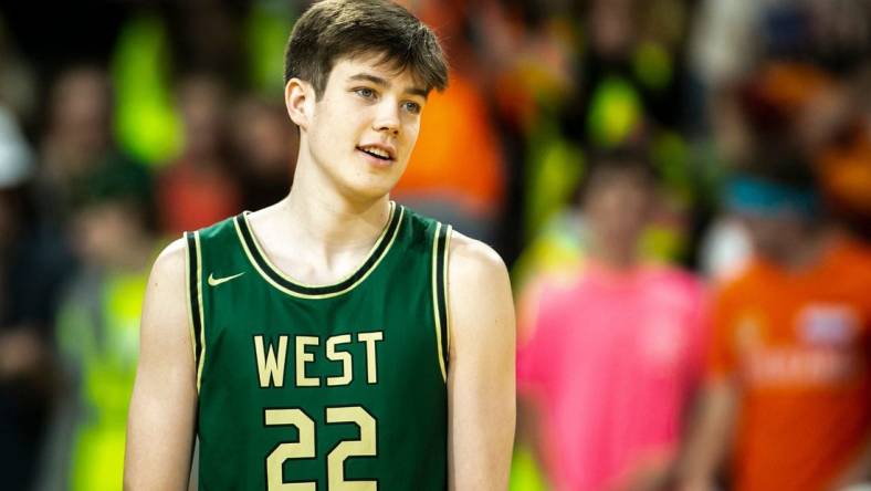 Iowa City West's Jack McCaffery (22) is introduced during a Class 4A high school boys basketball game against Iowa City High, Sunday, Jan. 8, 2023, at Xtream Arena in Coralville, Iowa.

230108 City West B 005 Jpg