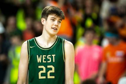 Iowa City West's Jack McCaffery (22) is introduced during a Class 4A high school boys basketball game against Iowa City High, Sunday, Jan. 8, 2023, at Xtream Arena in Coralville, Iowa.

230108 City West B 005 Jpg