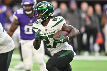 Dec 4, 2022; Minneapolis, Minnesota, USA; New York Jets running back Zonovan Knight (27) in action against the Minnesota Vikings at U.S. Bank Stadium. Mandatory Credit: Jeffrey Becker-USA TODAY Sports