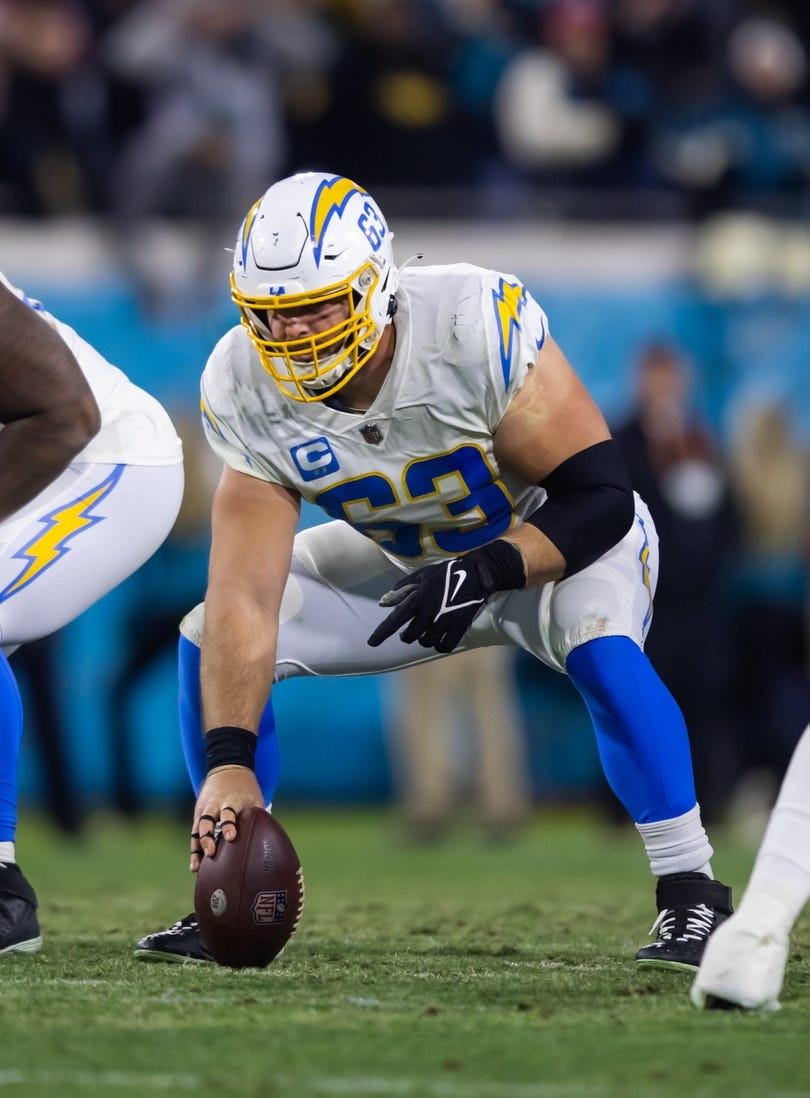 Jan 14, 2023; Jacksonville, Florida, USA; Los Angeles Chargers center Corey Linsley (63) against the Jacksonville Jaguars during a wild card playoff game at TIAA Bank Field. Mandatory Credit: Mark J. Rebilas-USA TODAY Sports