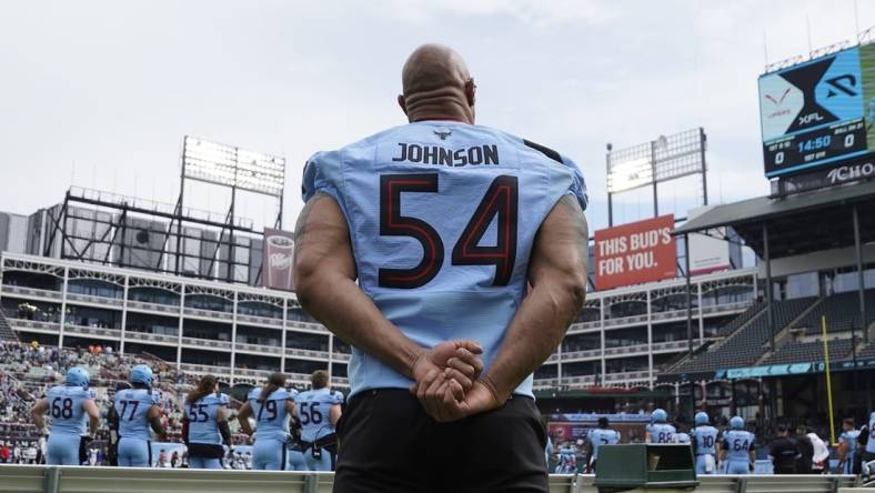 Feb 18, 2023; Arlington, TX, USA; XFL owner Dwayne Johnson on the sidelines during the first half between the Vegas Vipers and the Arlington Renegades at Choctaw Stadium. Mandatory Credit: Raymond Carlin III-USA TODAY Sports