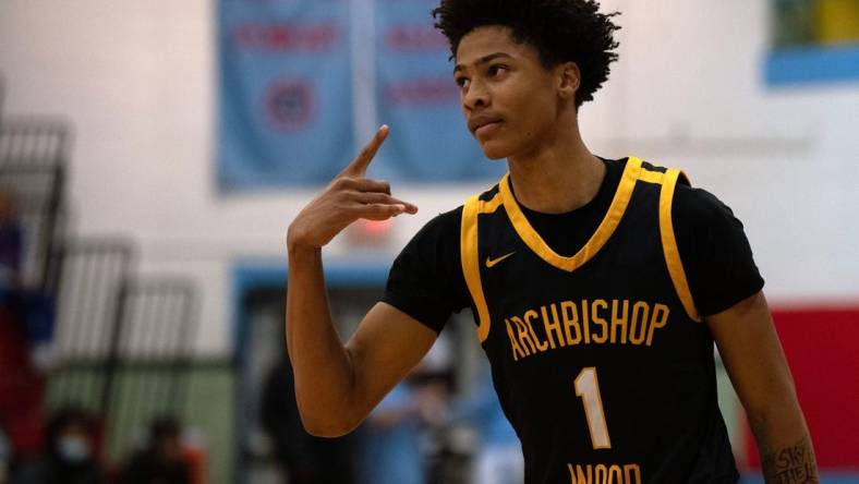 Archbishop Wood junior Jalil Bethea celebrates after scoring at Father Judge High School in Philadelphia on Wednesday, March 1, 2023. Archbishop Wood defeated Olney High School in the District 12 Class 6A third-place game, 88-47.

Bb Olneyatwood01