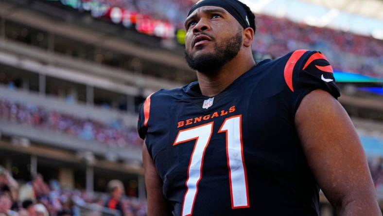 Cincinnati Bengals offensive tackle La'el Collins (71) walks for the locker room before halftime in the second quarter of the NFL Week 7 game between the Cincinnati Bengals and the Atlanta Falcons at Paycor Stadium in downtown Cincinnati on Sunday, Oct. 23, 2022. The Bengals led 28-17 at halftime. 


Mandatory Credit: Sam Greene-The Enquirer

Atlanta Falcons At Cincinnati Bengals Nfl Week 7