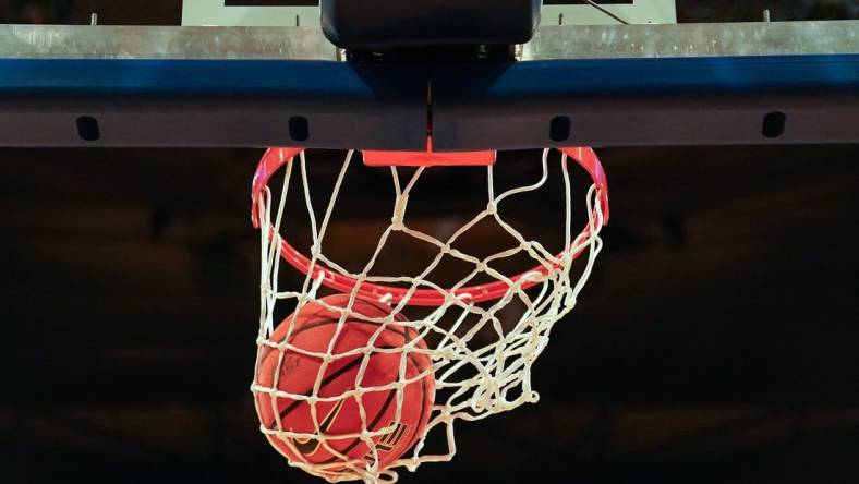 A basketball goes through the hoop during warm ups before the first half of an NCAA college basketball game between the Creighton Bluejays and the Xavier Musketeers during the semifinal round of the Big East Conference tournament, Friday, March 10, 2023, at Madison Square Garden in New York.

Xavier Creighton Big East Basketball Tournament March 10 0279