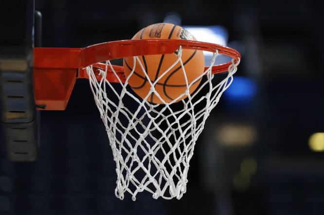 Mar 16, 2023; Columbus, OH, USA; A ball enters the hoop during NCAA Tournament First Round Columbus Practice at Nationwide Arena. Mandatory Credit: Joseph Maiorana-USA TODAY Sports