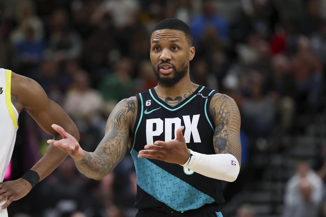 Mar 22, 2023; Salt Lake City, Utah, USA; Portland Trail Blazers guard Damian Lillard (0) reacts to a call against the Utah Jazz in the fourth quarter at Vivint Arena. Mandatory Credit: Rob Gray-USA TODAY Sports