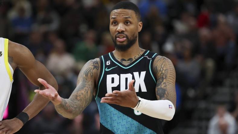 Mar 22, 2023; Salt Lake City, Utah, USA; Portland Trail Blazers guard Damian Lillard (0) reacts to a call against the Utah Jazz in the fourth quarter at Vivint Arena. Mandatory Credit: Rob Gray-USA TODAY Sports