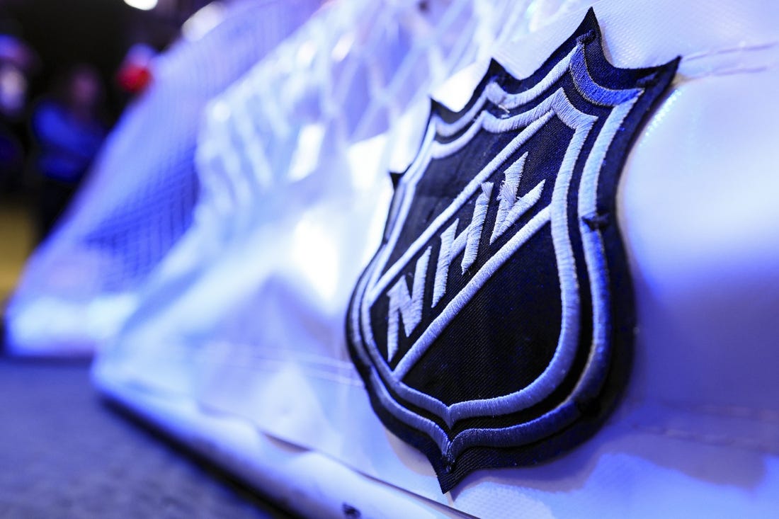 Mar 24, 2023; Columbus, Ohio, USA;  The NHL logo is seen on the game net prior to the game between the New York Islanders and the Columbus Blue Jackets at Nationwide Arena. Mandatory Credit: Aaron Doster-USA TODAY Sports