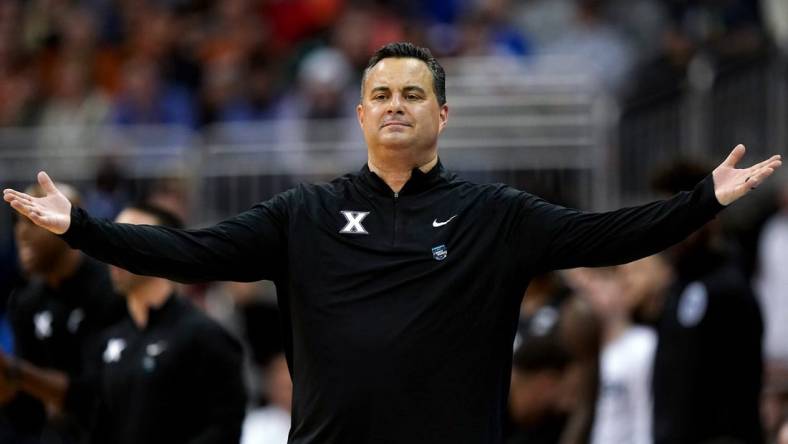 Xavier Musketeers head coach Sean Miller reacts to a play during the first half of a Sweet 16 college basketball game between the Xavier Musketeers and the Texas Longhorns in the Midwest Regional of the NCAA Tournament, Friday, March 24, 2023, at T-Mobile Center in Kansas City, Mo.

Ncaa Xavier Texas Ncaa Sweet 16 March 24 0280