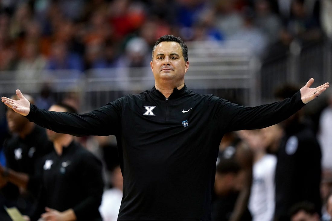 Xavier Musketeers head coach Sean Miller reacts to a play during the first half of a Sweet 16 college basketball game between the Xavier Musketeers and the Texas Longhorns in the Midwest Regional of the NCAA Tournament, Friday, March 24, 2023, at T-Mobile Center in Kansas City, Mo.

Ncaa Xavier Texas Ncaa Sweet 16 March 24 0280