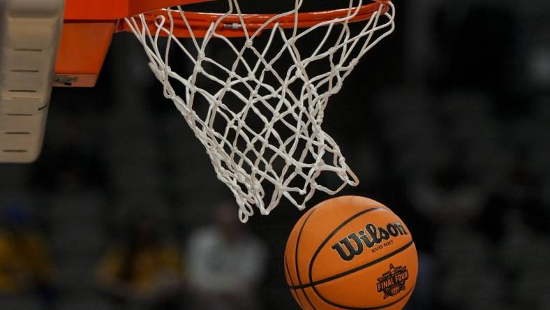 Mar 30, 2023; Dallas, TX, USA; The NCAA Women   s tournament logo is seen on a Wilson game ball during team practice for the Virginia Tech Hokies at the American Airlines Center. Mandatory Credit: Kirby Lee-USA TODAY Sports