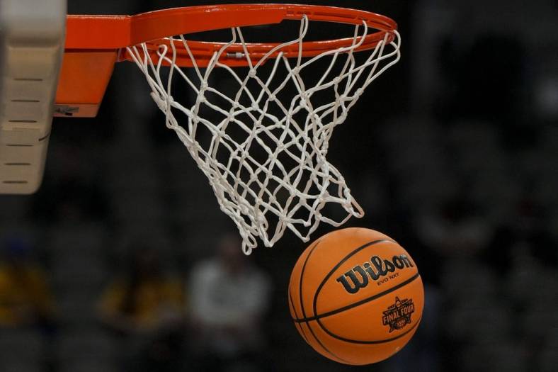 Mar 30, 2023; Dallas, TX, USA; The NCAA Women   s tournament logo is seen on a Wilson game ball during team practice for the Virginia Tech Hokies at the American Airlines Center. Mandatory Credit: Kirby Lee-USA TODAY Sports