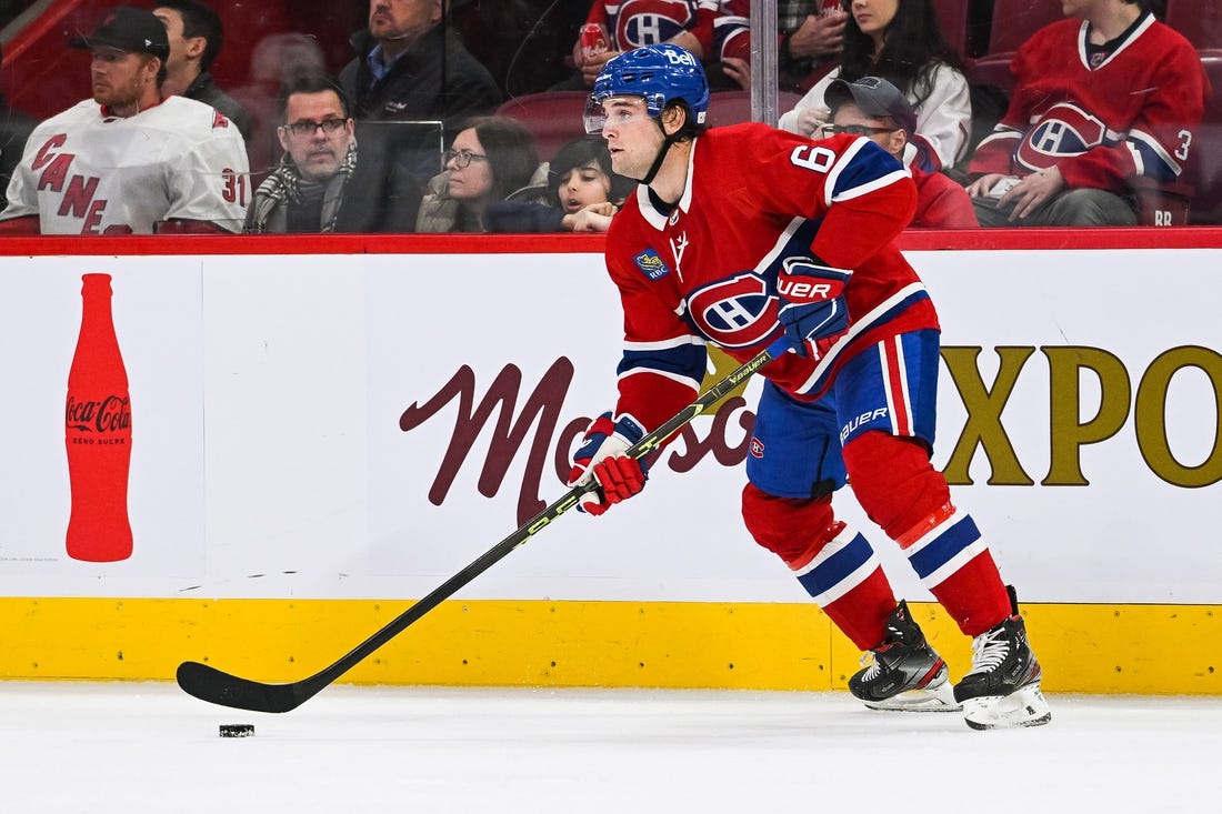 Apr 1, 2023; Montreal, Quebec, CAN; Montreal Canadiens defenseman Chris Wideman (6) plays the puck against the Carolina Hurricanes during the second period at Bell Centre. Mandatory Credit: David Kirouac-USA TODAY Sports