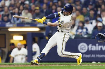 Apr 4, 2023; Milwaukee, Wisconsin, USA;  Milwaukee Brewers center fielder Garrett Mitchell (5) hits a home run during the seventh inning against the New York Mets at American Family Field. Mandatory Credit: Jeff Hanisch-USA TODAY Sports