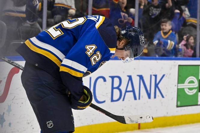Apr 6, 2023; St. Louis, Missouri, USA;  St. Louis Blues right wing Kasperi Kapanen (42) reacts after scoring the game winning goal in overtime against the New York Rangers at Enterprise Center. Mandatory Credit: Jeff Curry-USA TODAY Sports