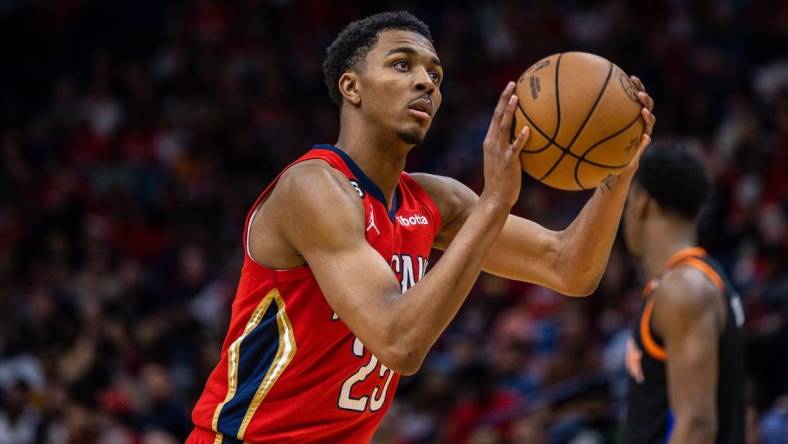 Apr 7, 2023; New Orleans, Louisiana, USA;  New Orleans Pelicans guard Trey Murphy III (25) shoots a free throw against the New York Knicks during the second half at Smoothie King Center. Mandatory Credit: Stephen Lew-USA TODAY Sports