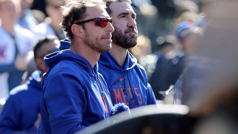 Apr 9, 2023; New York City, New York, USA; New York Mets starting pitchers Max Scherzer (left) and Justin Verlander stand together in the dugout during the seventh inning against the Miami Marlins at Citi Field. Mandatory Credit: Brad Penner-USA TODAY Sports