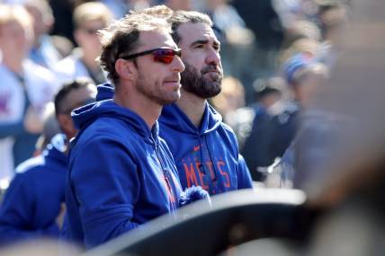 Apr 9, 2023; New York City, New York, USA; New York Mets starting pitchers Max Scherzer (left) and Justin Verlander stand together in the dugout during the seventh inning against the Miami Marlins at Citi Field. Mandatory Credit: Brad Penner-USA TODAY Sports