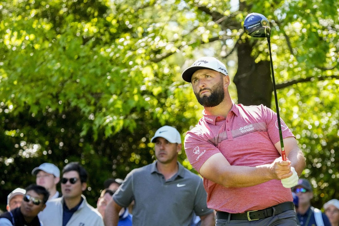 Apr 9, 2023; Augusta, Georgia, USA; Brooks Koepka watches as Jon Rahm tees off on the seventh hole during the final round of The Masters golf tournament. Mandatory Credit: Rob Schumacher-USA TODAY Network

Pga Masters Tournament Final Round