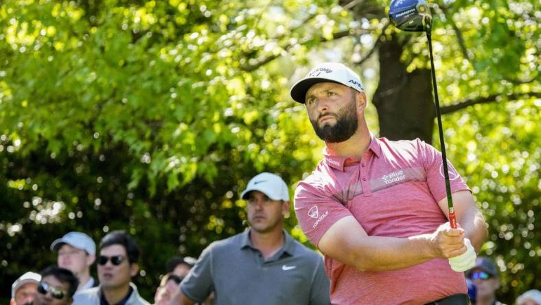 Apr 9, 2023; Augusta, Georgia, USA; Brooks Koepka watches as Jon Rahm tees off on the seventh hole during the final round of The Masters golf tournament. Mandatory Credit: Rob Schumacher-USA TODAY Network

Pga Masters Tournament Final Round