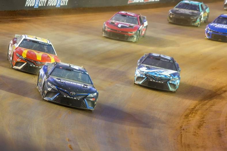 Apr 9, 2023; Bristol, Tennessee, USA; NASCAR Cup Series driver Tyler Reddick (45) leads a pack of cars at the Bristol Motor Speedway Dirt Course. Mandatory Credit: Randy Sartin-USA TODAY Sports
