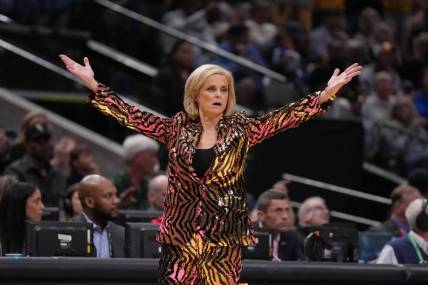 Apr 2, 2023; Dallas, TX, USA; LSU Lady Tigers head coach Kim Mulkey reacts against the Iowa Hawkeyes during the NCAA Womens Basketball Final Four National Championship at American Airlines Center. Mandatory Credit: Kirby Lee-USA TODAY Sports