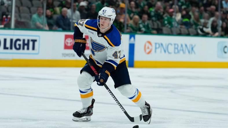 Apr 13, 2023; Dallas, Texas, USA;  St. Louis Blues defenseman Torey Krug (47) skates with the puck against the Dallas Stars during the first period at American Airlines Center. Mandatory Credit: Chris Jones-USA TODAY Sports