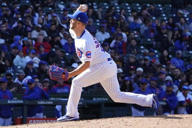 Apr 27, 2023; Chicago, Illinois, USA; Chicago Cubs relief pitcher Brad Boxberger (25) throws against the San Diego Padres during the ninth inning at Wrigley Field. Mandatory Credit: David Banks-USA TODAY Sports