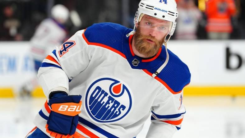 May 3, 2023; Las Vegas, Nevada, USA; Edmonton Oilers defenseman Mattias Ekholm (14) warms up before the start of game one of the second round of the 2023 Stanley Cup Playoffs against the Vegas Golden Knights at T-Mobile Arena. Mandatory Credit: Stephen R. Sylvanie-USA TODAY Sports