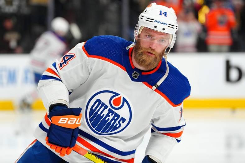 May 3, 2023; Las Vegas, Nevada, USA; Edmonton Oilers defenseman Mattias Ekholm (14) warms up before the start of game one of the second round of the 2023 Stanley Cup Playoffs against the Vegas Golden Knights at T-Mobile Arena. Mandatory Credit: Stephen R. Sylvanie-USA TODAY Sports