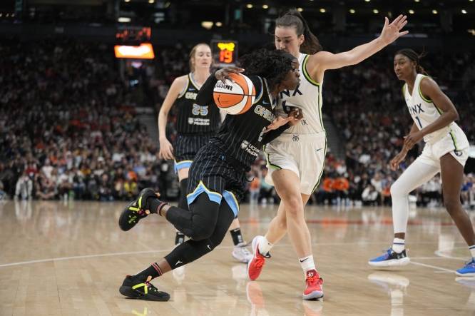 May 13, 2023; Toronto, Ontario, Canada; Chicago Sky guard Kahleah Copper (2) drives to the net against Minnesota Lynx forward Bridget Carleton (6) during the first half at Scotiabank Arena. Mandatory Credit: John E. Sokolowski-USA TODAY Sports