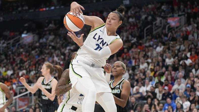 May 13, 2023; Toronto, Ontario, Canada; Minnesota Lynx guard Kayla McBride (21) rebounds against the Chicago Sky during the first half at Scotiabank Arena. Mandatory Credit: John E. Sokolowski-USA TODAY Sports