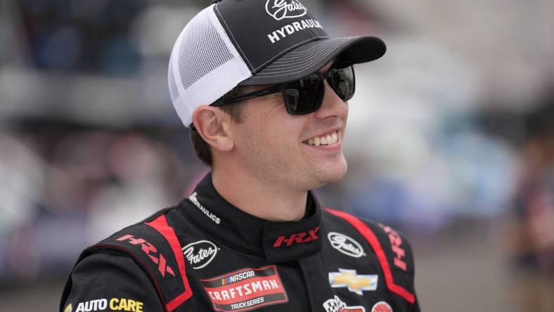 May 19, 2023; North Wilkesboro, North Carolina, USA; NASCAR Camping World Truck Series driver Christian Eckes smiles before truck practice at North Wilkesboro Speedway. Mandatory Credit: Jim Dedmon-USA TODAY Sports