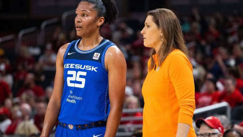 May 19, 2023; Indianapolis, Indiana, USA; Connecticut Sun head coach Stephanie White talks to Connecticut Sun forward Alyssa Thomas (25) in the first half against the Indiana Fever at Gainbridge Fieldhouse. Mandatory Credit: Trevor Ruszkowski-USA TODAY Sports