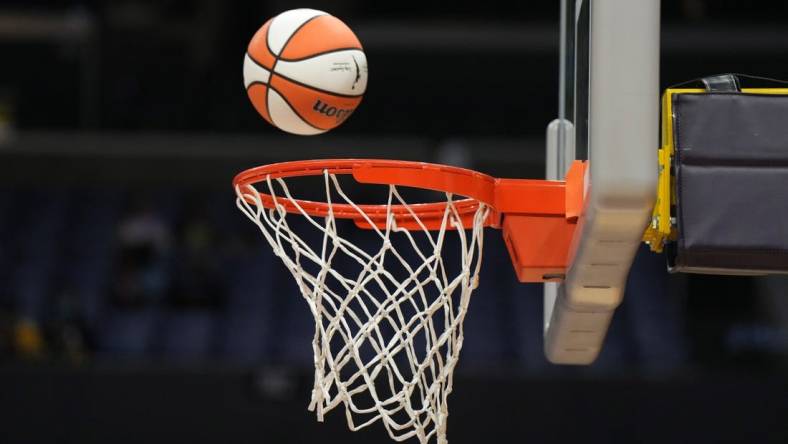 May 25, 2023; Los Angeles, California, USA; Wilson official basketball with WNBA logo goes through the net during the game between the LA Sparks and the Las Vegas Aces at Crypto.com Arena. Mandatory Credit: Kirby Lee-USA TODAY Sports